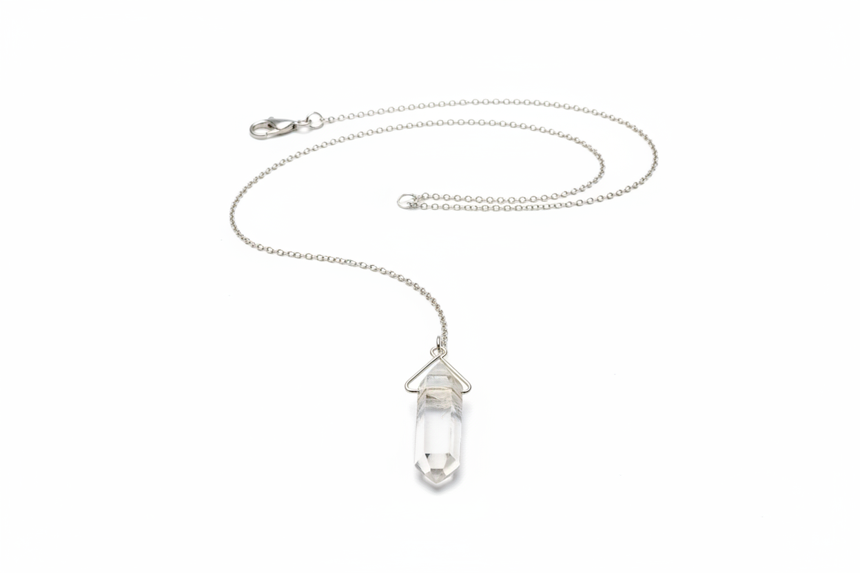 Necklace with a clear crystal pendant on a white background